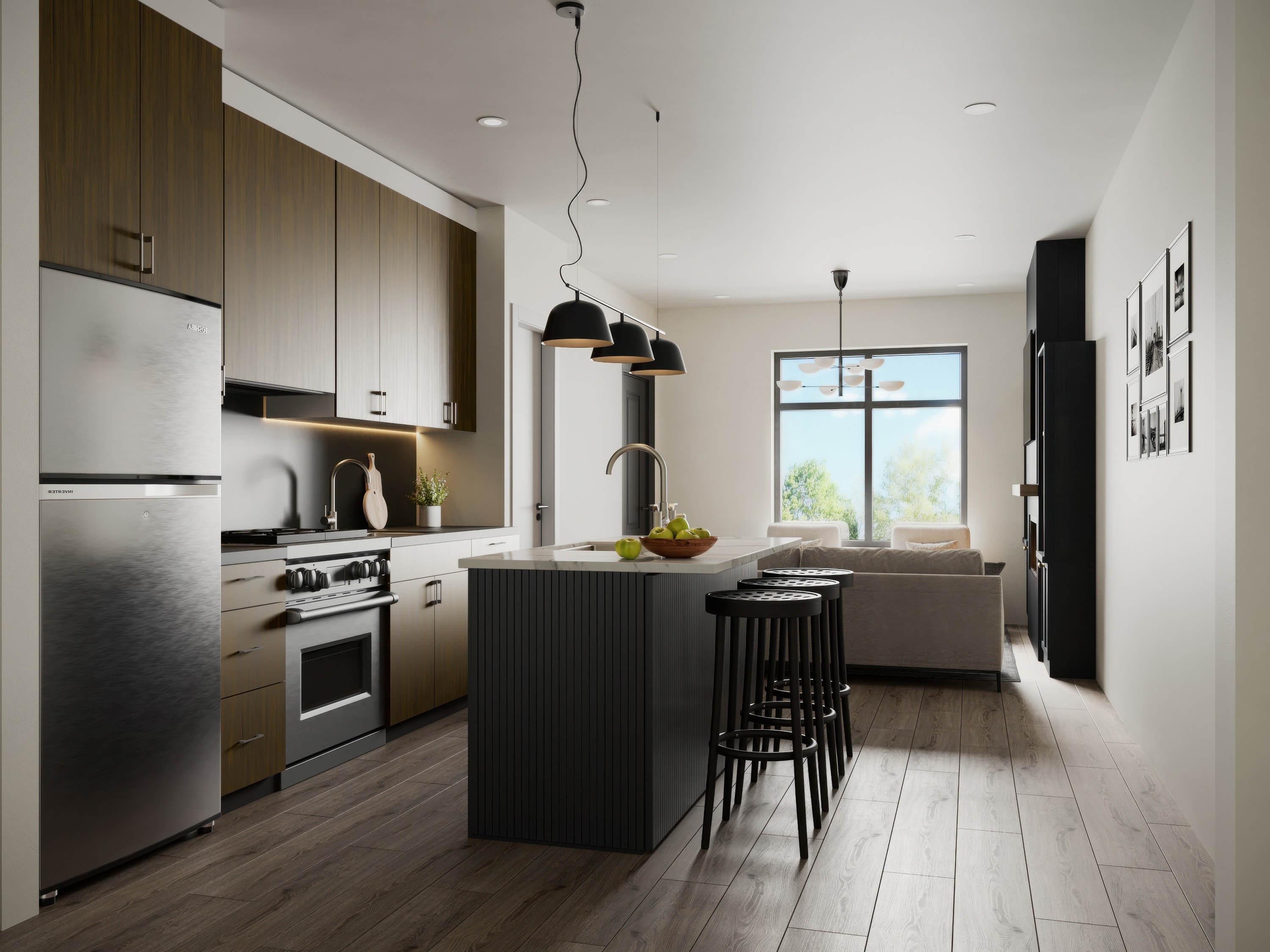 Kitchen island with pendant lighting and stainless appliances